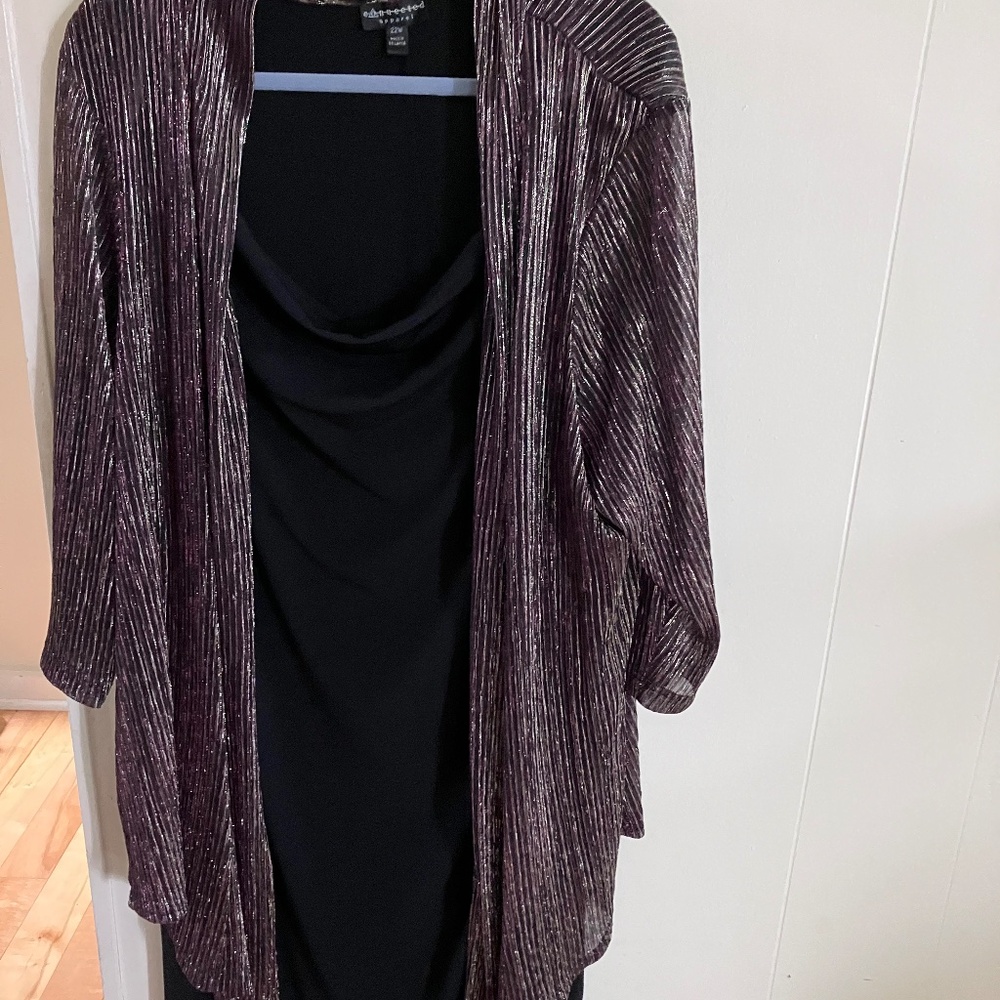 Dress one piece dress drape neck lower cut dress is black with jacket